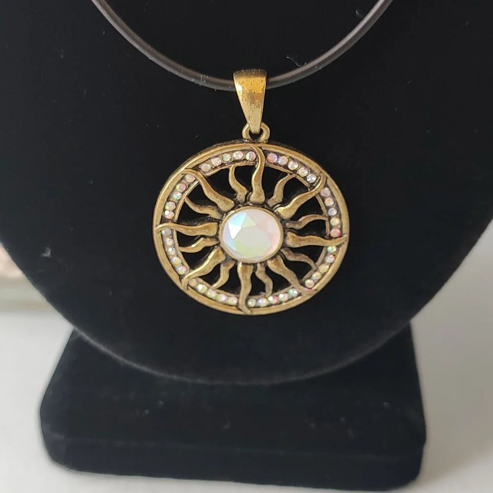 Radiant Gold Sunburst Necklace with Central Gem